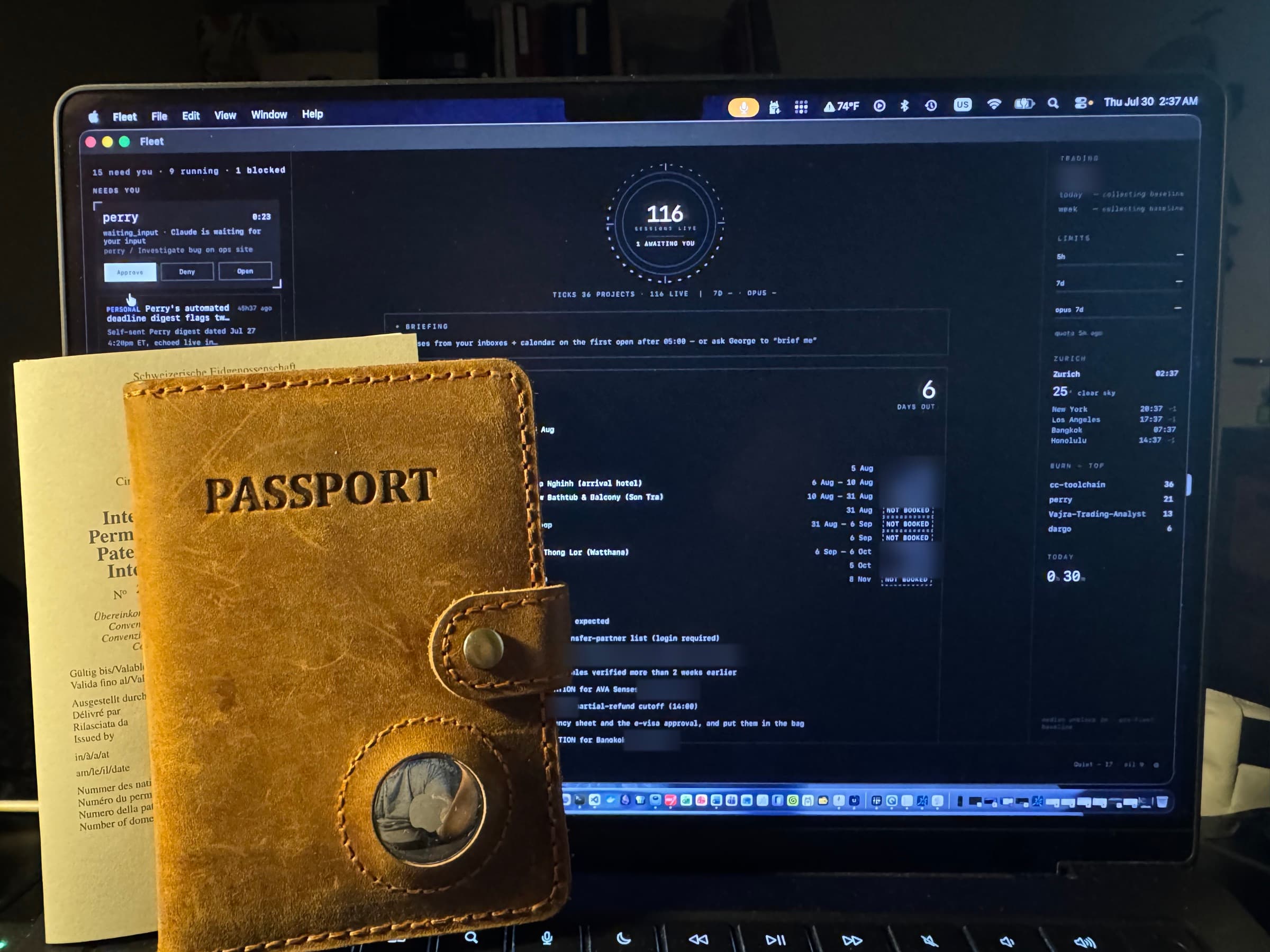 A leather passport wallet and a Swiss international driving permit propped against a laptop running Fleet, whose briefing panel lists the booked and still-unbooked legs of the trip beside a six-days-out countdown.